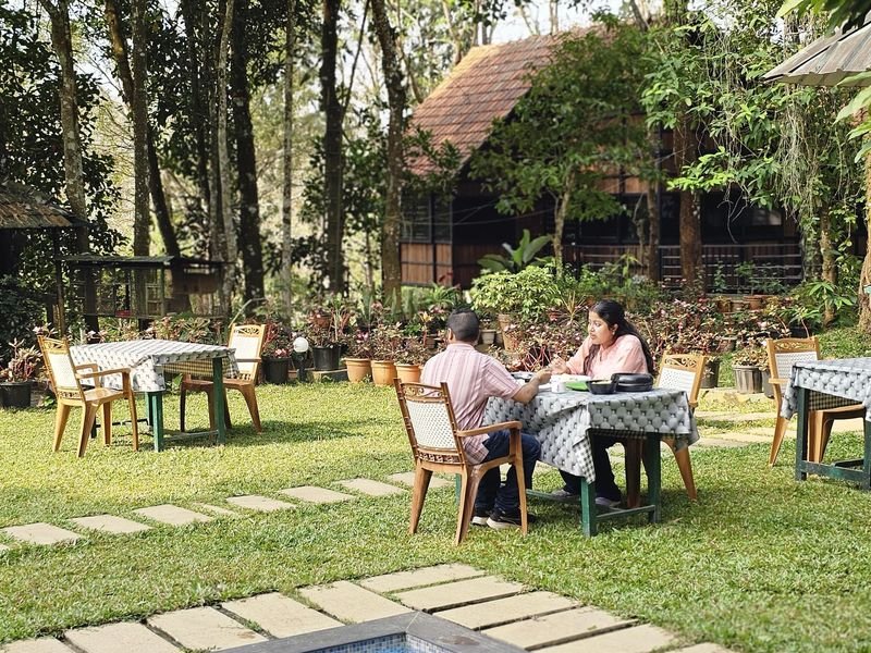 Couples enjoying their time at a greenery restaurant