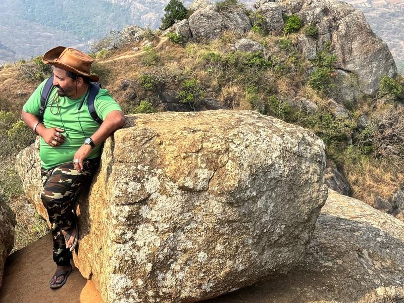 Driver Antony exploring and posing with a cowboy hat while trekking