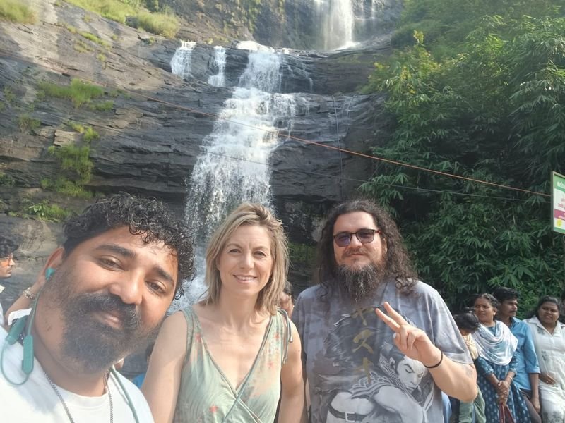 Driver Antony with foreign guests at waterfalls 2
