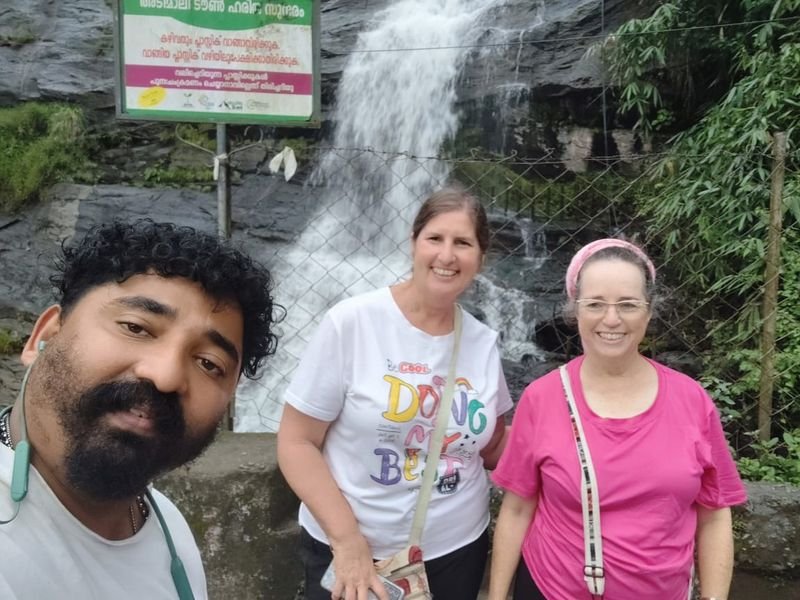 Driver Antony with foreign guests at waterfalls 4