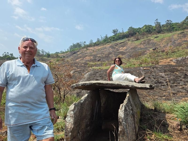 Foreign tourist posing at a structure