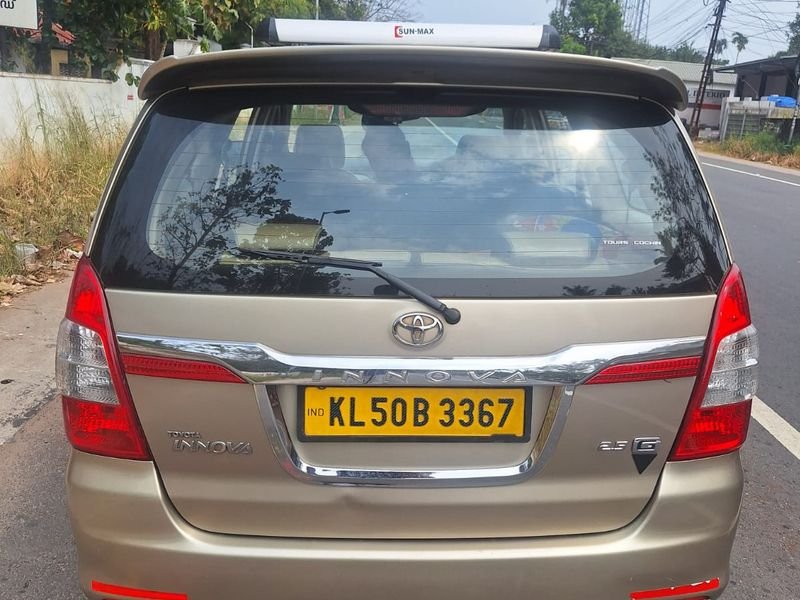 Golden SUV back side view