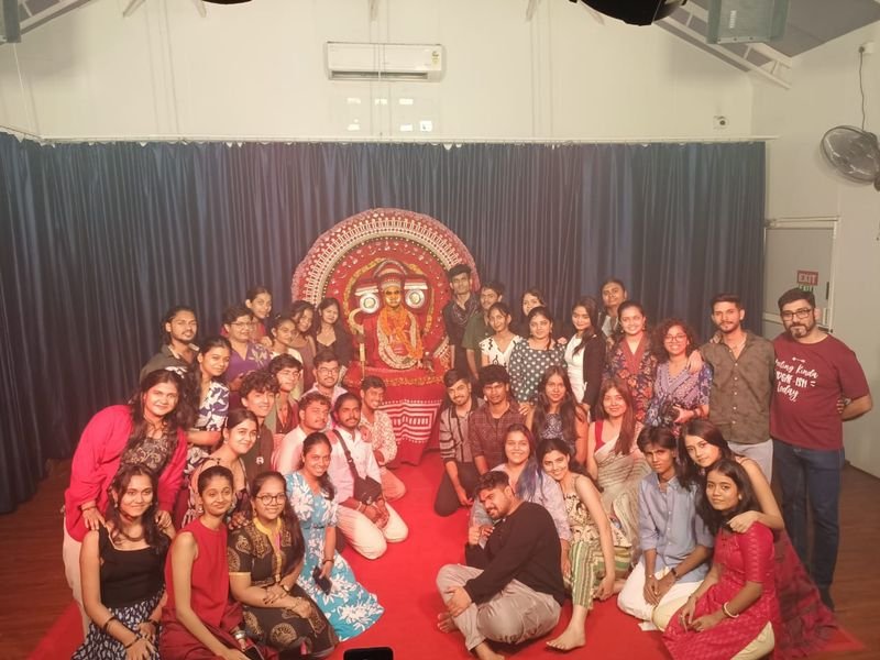 Indian Students Group with Theyyam Art Form