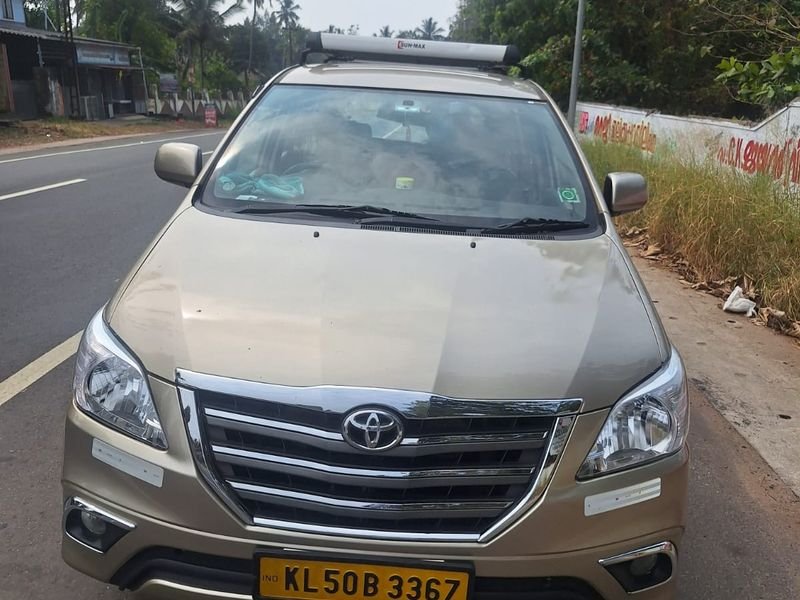 golden sedan taxi front view